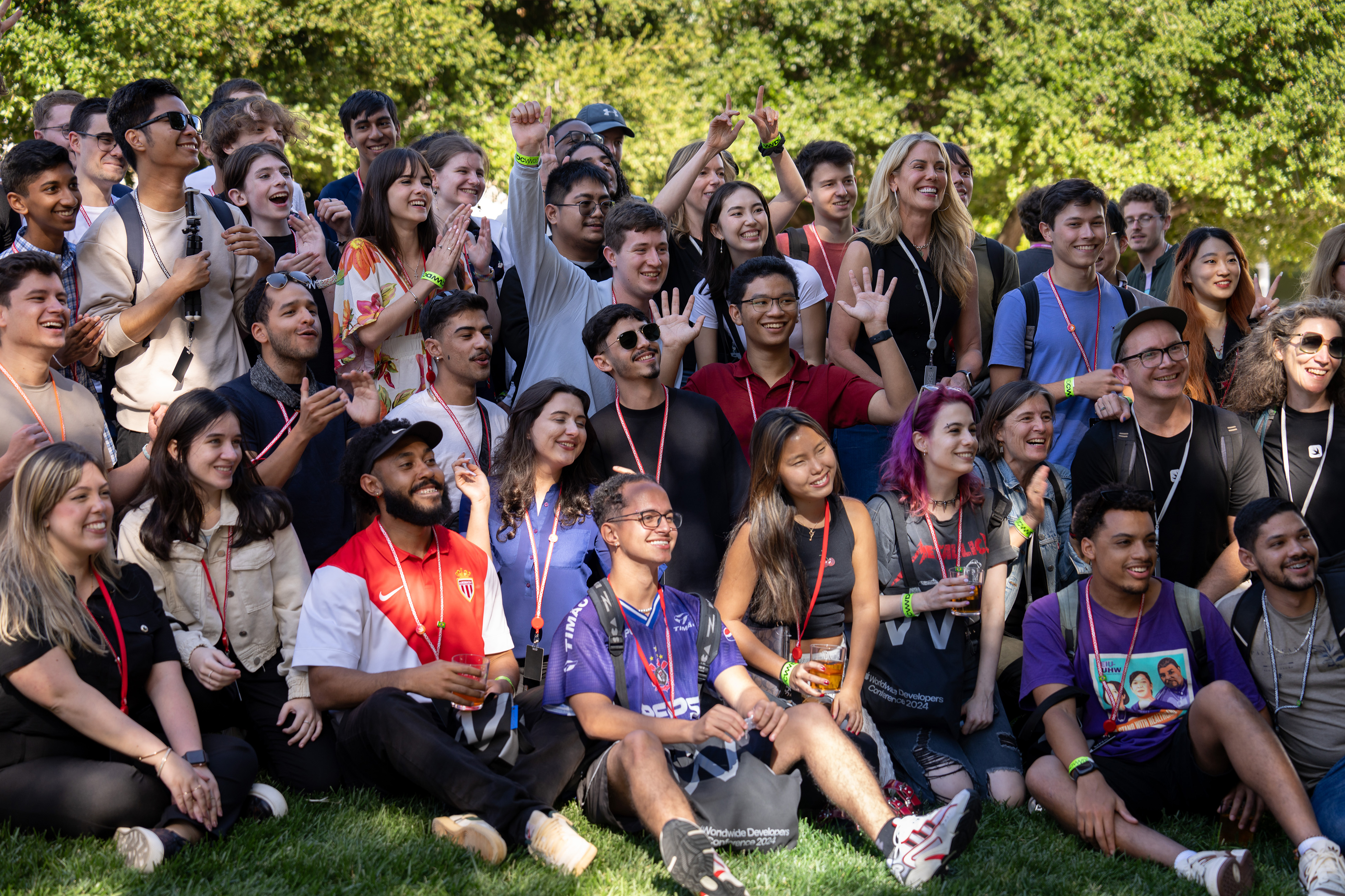 2025 Swift Student Challenge Winners posing outdoors at WWDC.